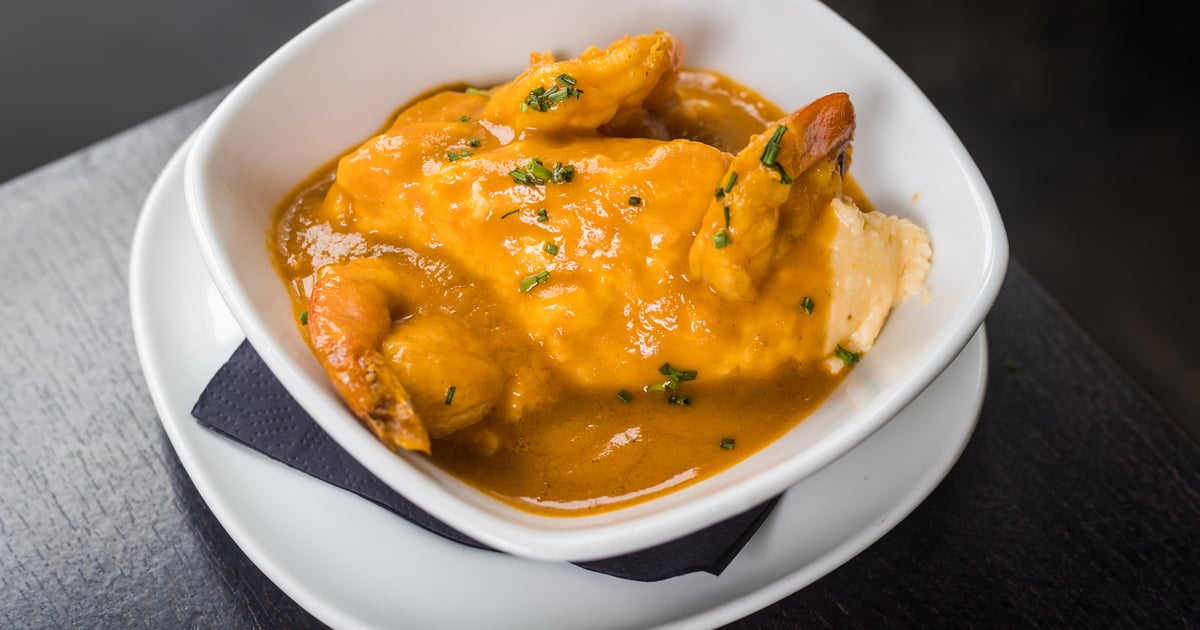 Cheddar Jalapeno Grits w/ Blackened Shrimp & Lobster Gumbo Sauce