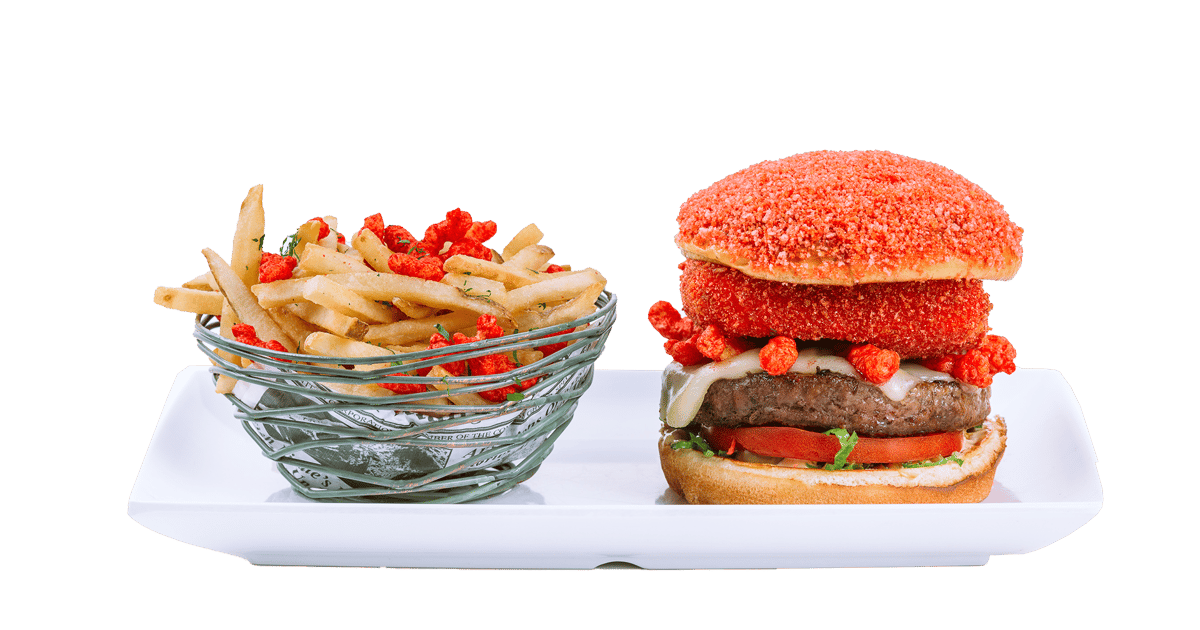 Spice up your burger game with a fiery twist! 🔥🍔 Crunch into a flavor  explosion with our Chilli Cheetos Burger – where heat meets…