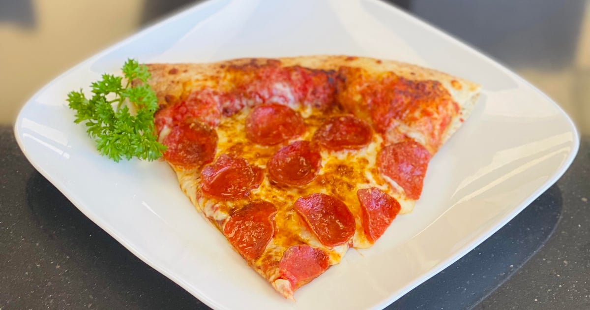 SLICE OF PEPPERONI PIZZA Spanish Karine's Pizza & Deli Pizza