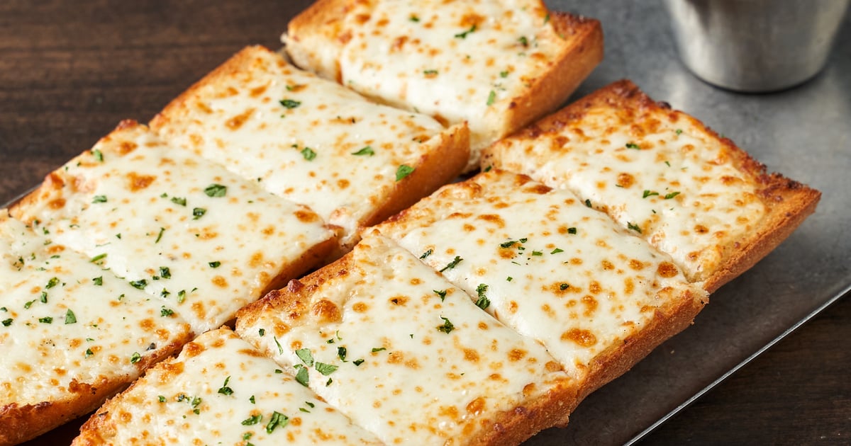 CHEESY GARLIC BREAD WITH MARINARA Menu Spinato's Pizzeria and
