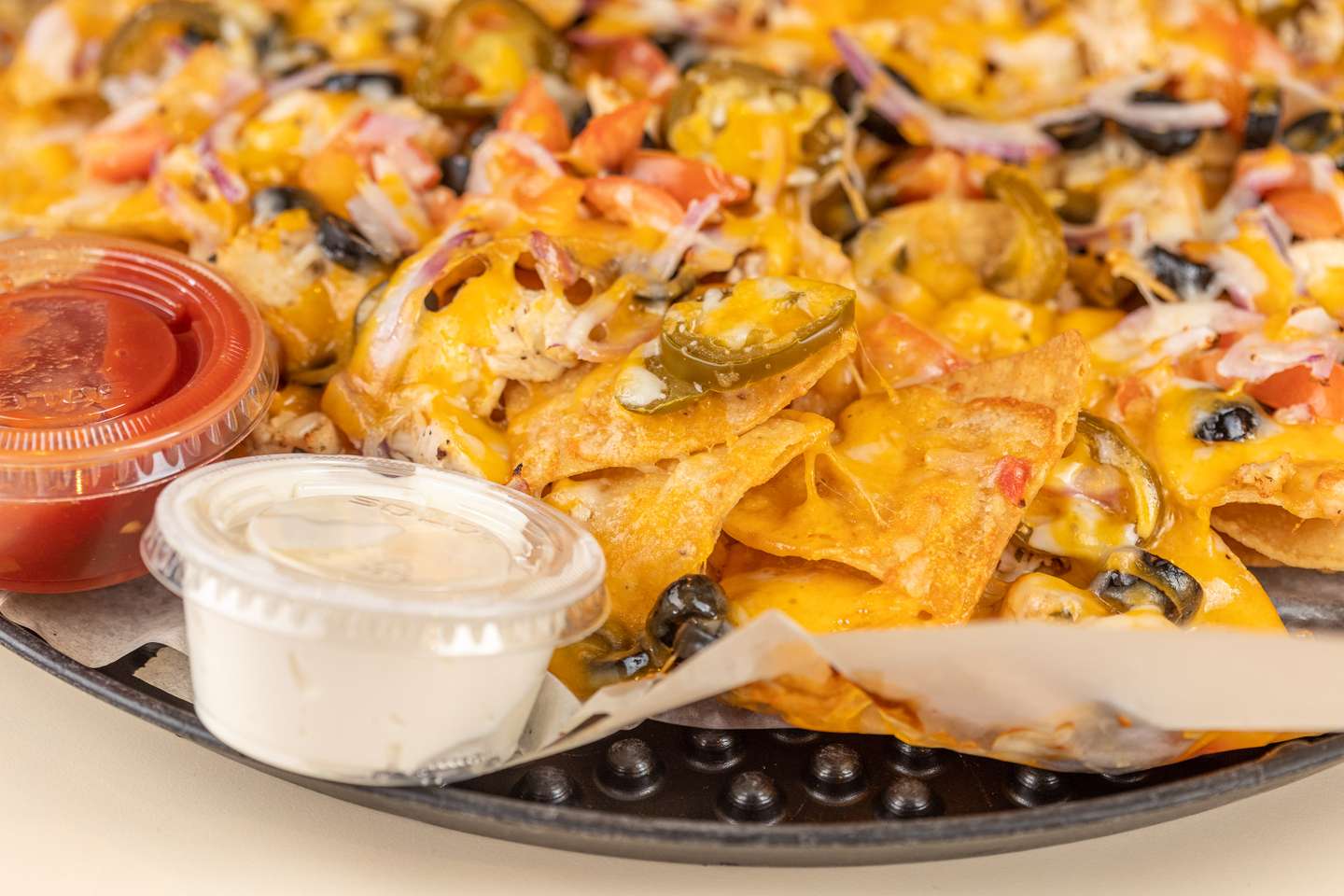 Order Nacho Supreme food online from Romeos Pizza store, Yarmouth on bringmethat.com