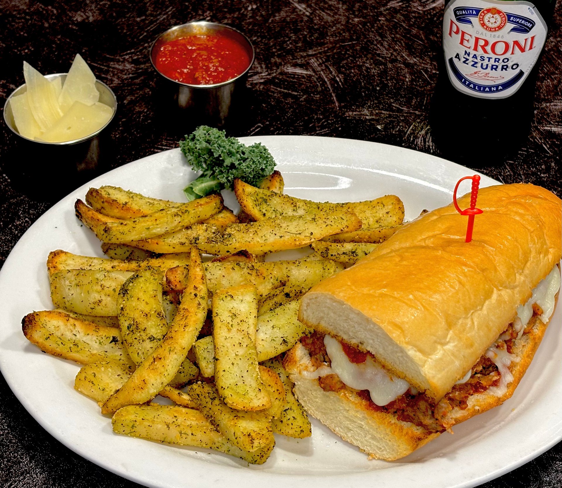 Meatball Sub recipe served on a plate, by Angelo's Italian Restaurant - Wichita Meatball Sub recipe served on a plate, by Angelo's Italian Restaurant - Wichita