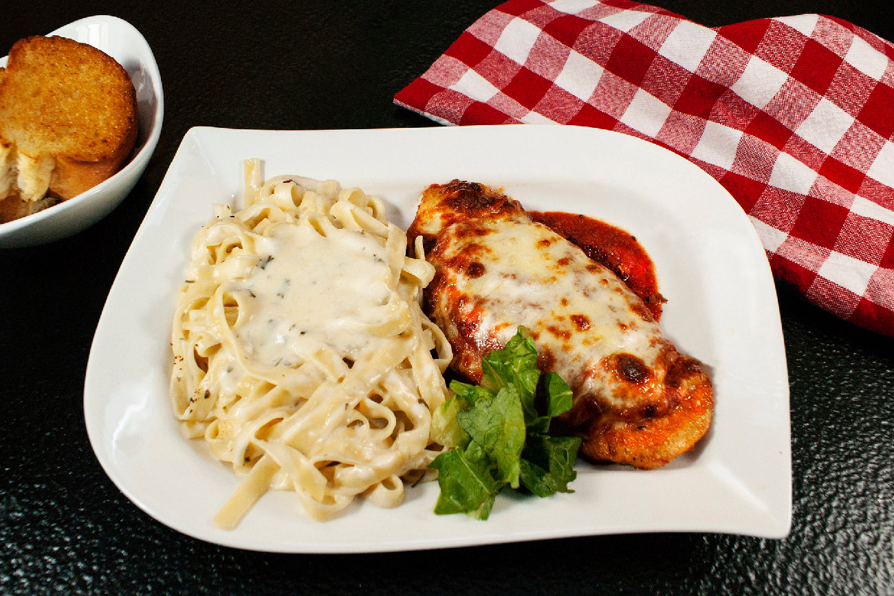 Chicken Parmigiana recipe served on a plate, by Angelo's Italian Restaurant - Wichita Chicken Parmigiana recipe served on a plate, by Angelo's Italian Restaurant - Wichita