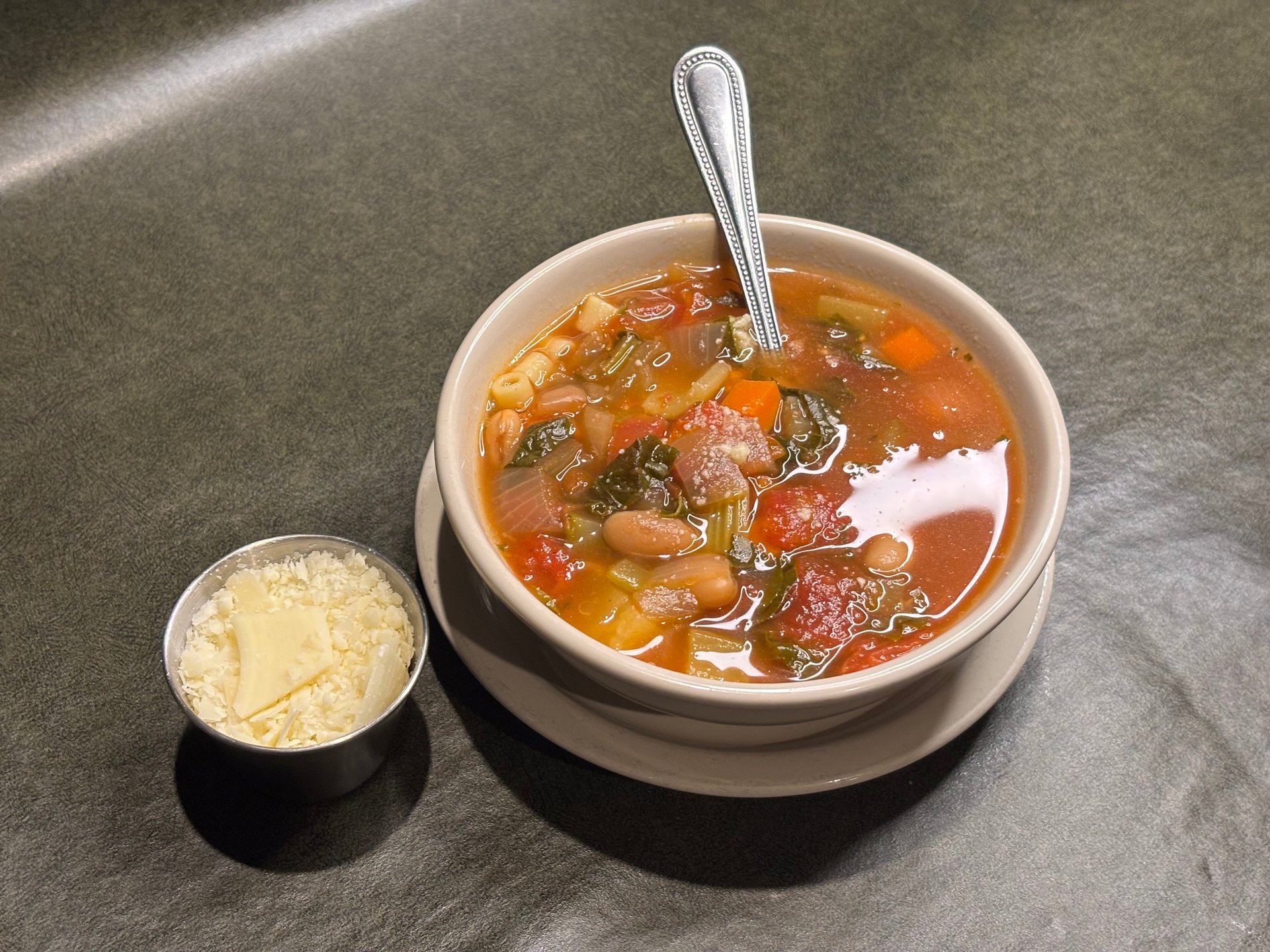 Minestrone Soup recipe served on a plate, by Angelo's Italian Restaurant - Wichita Minestrone Soup recipe served on a plate, by Angelo's Italian Restaurant - Wichita