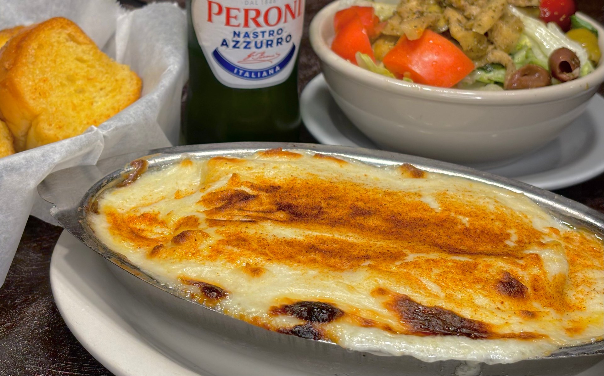 Cannelloni recipe served on a plate, by Angelo's Italian Restaurant - Wichita Cannelloni recipe served on a plate, by Angelo's Italian Restaurant - Wichita