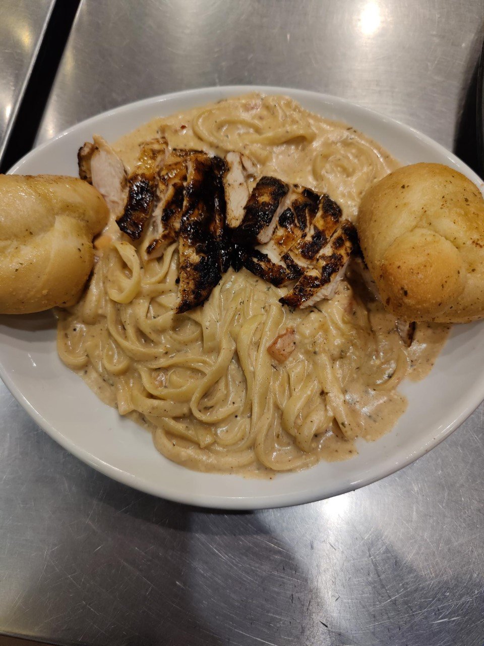Jerk Chicken Pasta recipe served on a plate, by Caribbean Jack's Jerk Chicken Pasta recipe served on a plate, by Caribbean Jack's