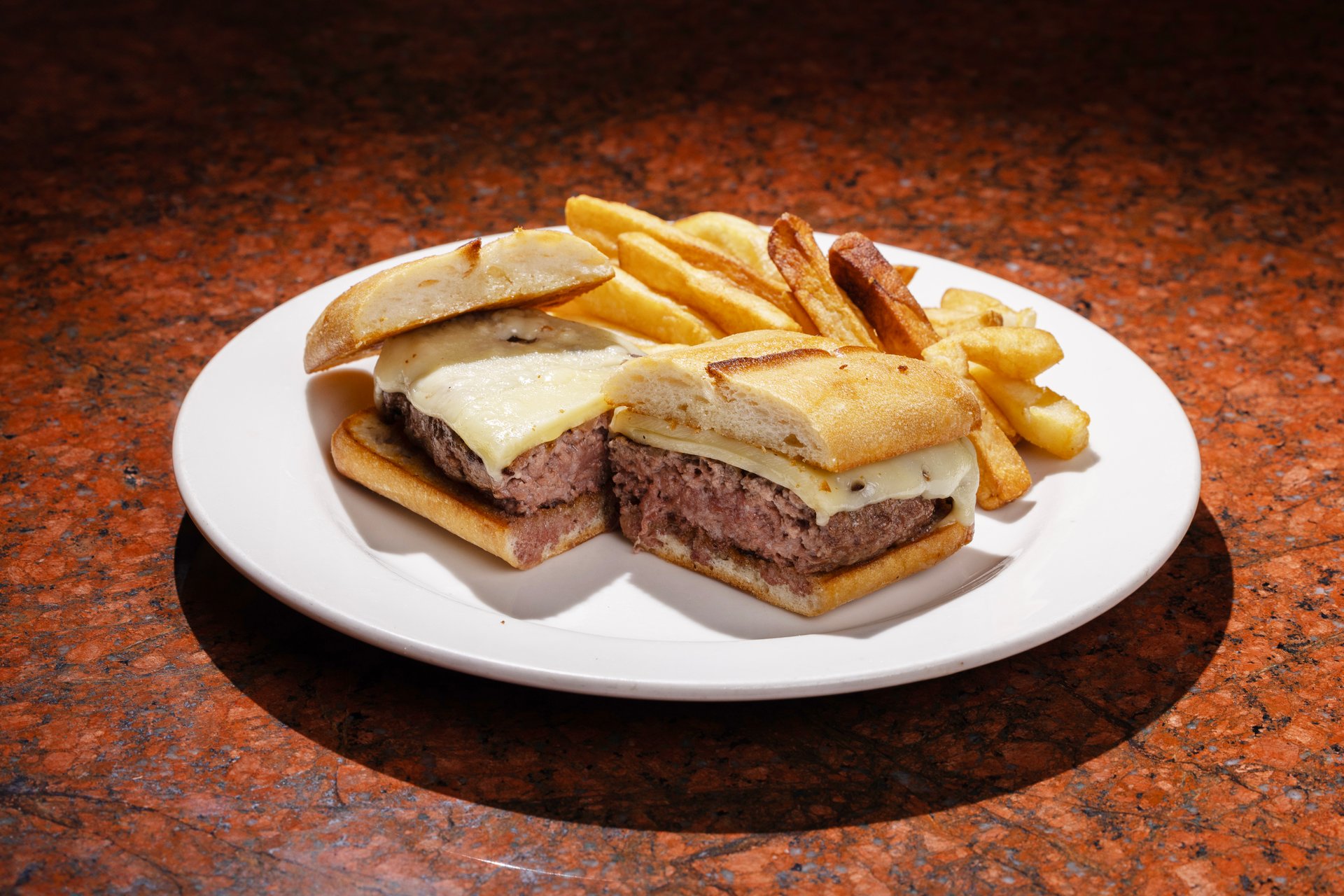 Original Joe's Famous Hamburger recipe served on a plate, by Original Joe's San Jose Original Joe's Famous Hamburger recipe served on a plate, by Original Joe's San Jose