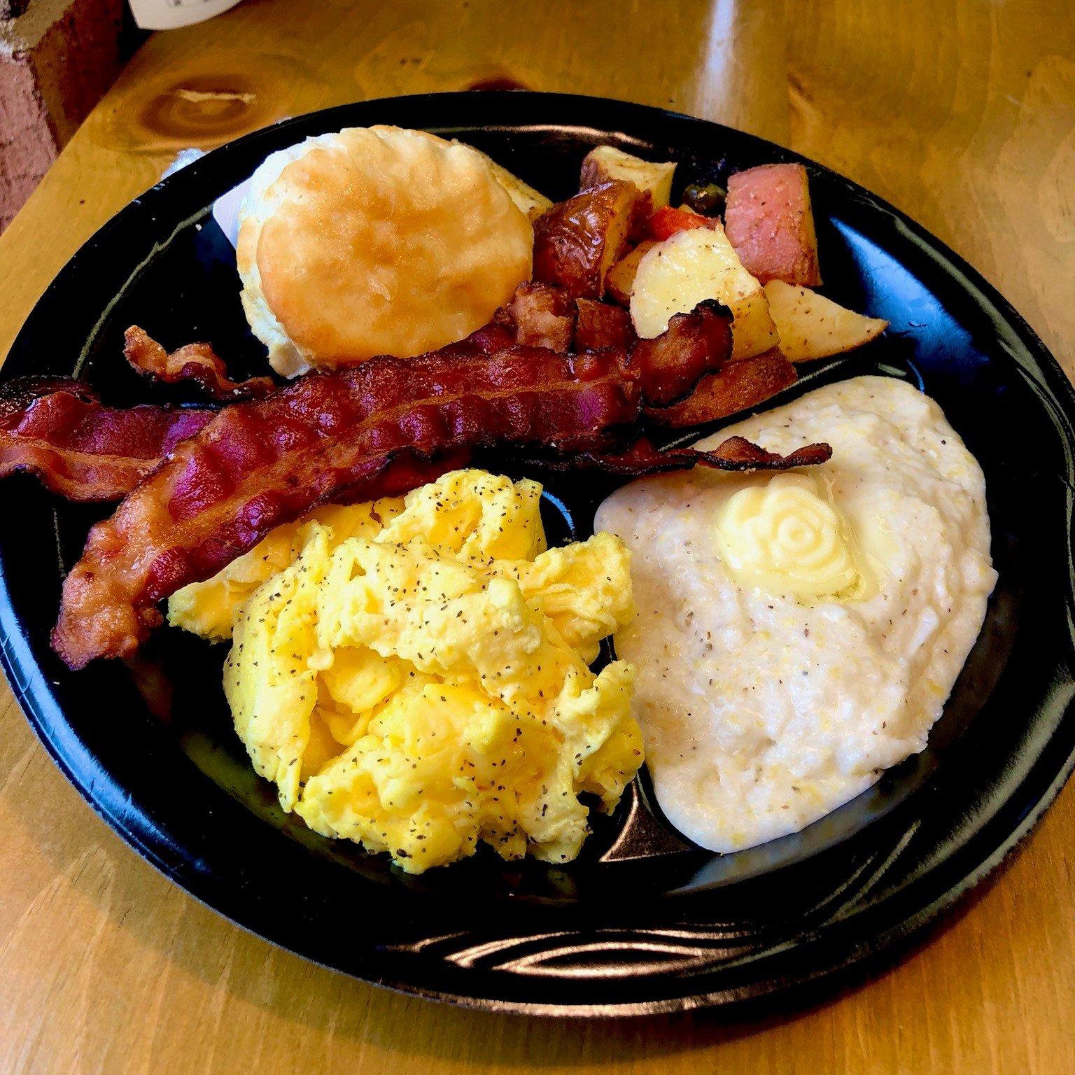 Breakfast is served 🥓🍳🍓 Bacon Egg and Cheese with Strawberry Preserves  all in between a buttery biscuit 🙌 All cooked on the Outpost Grill…