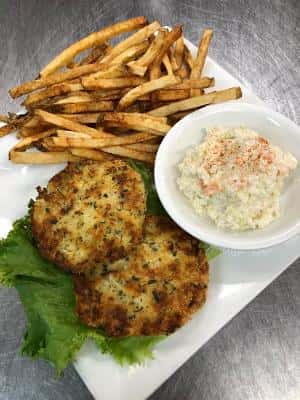 Crab cake Platter with hand cut French fries and homemade coleslaw. 
