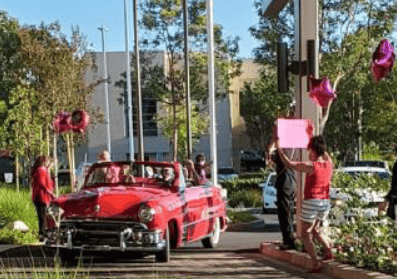 scholarship winners send off to college with a drive by parade