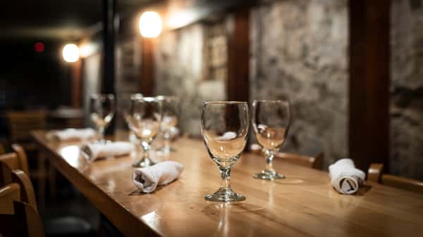 Interior ambiance - wine glasses set on table with silverware