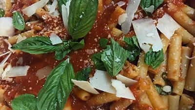 Pasta, tomato sauce, basil and parmesan