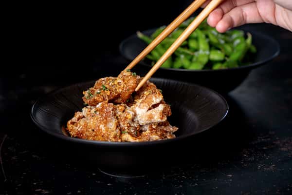 Person eating with chopsticks