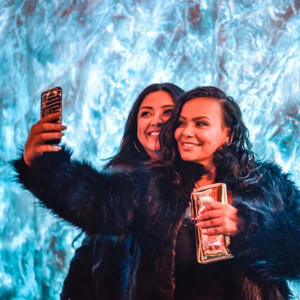 girls taking selfie