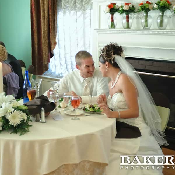 bride and groom at table