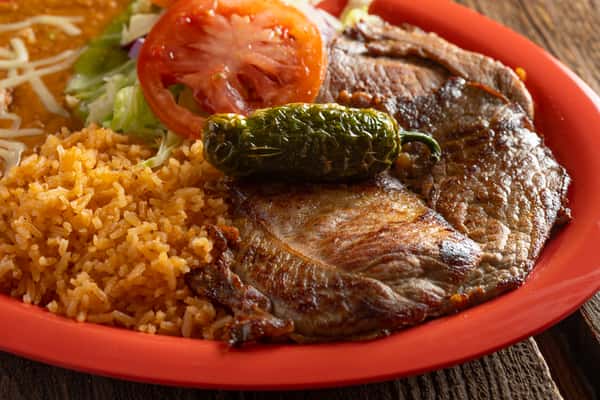 carne asada with rice and beans