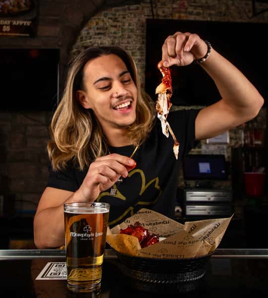 Staff eating wings