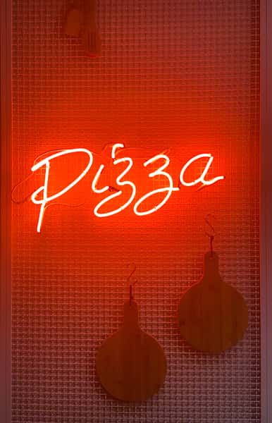Neon pizza sign