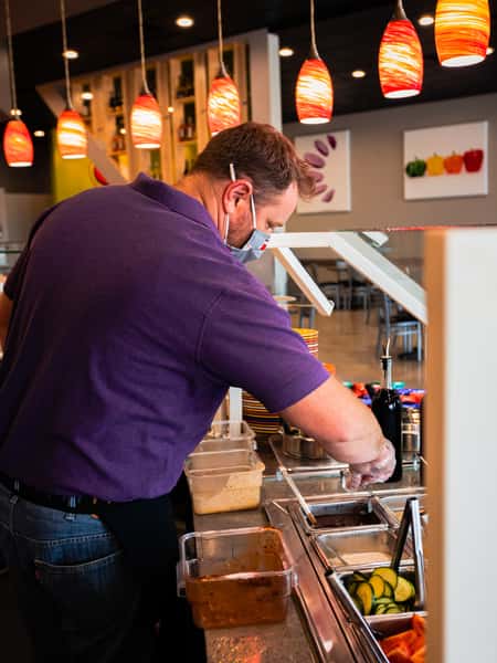 Staff prepping the food bar