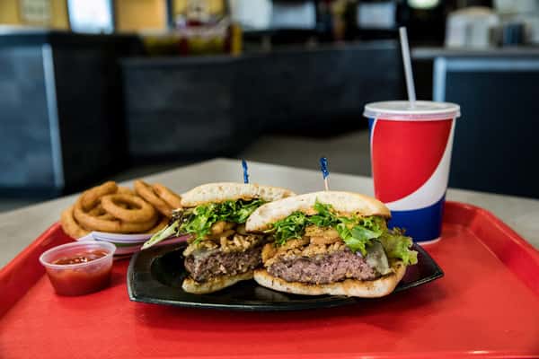 burger with pepsi and onion rings