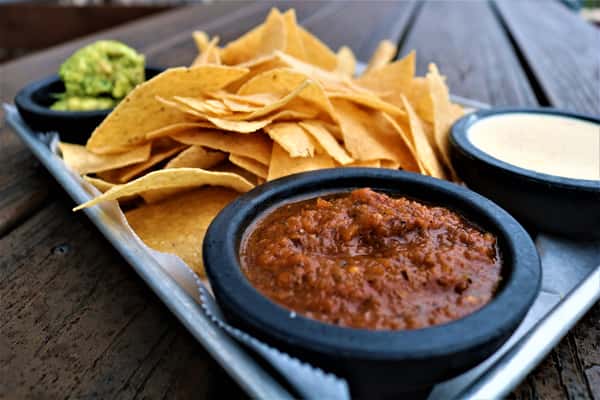 Ya dipped tortilla chips and dip appetizer