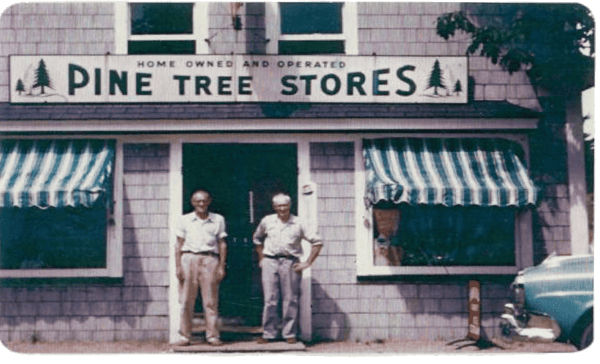 Salisbury brothers in front of the Pine Tree Stores, circa 1952