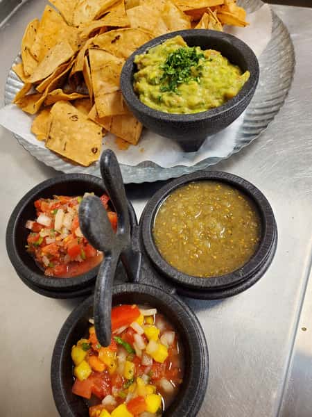 Guacamole with Chips and Trio House Salsa