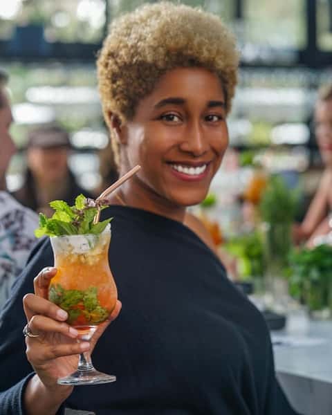employee with cocktail