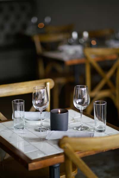 table set with wine glasses