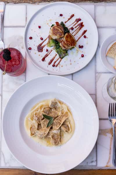 italian meal with cocktail