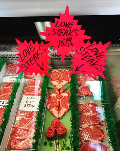 butcher shop display case of meat