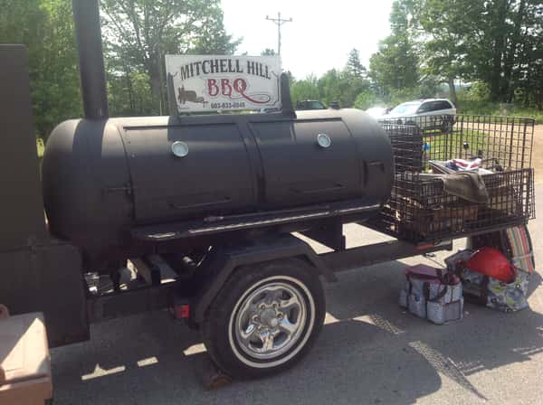 Bob and "Uncle" built this portable smoker in 2009. It houses a smoker, grill and steamer. This is where it all began. We started our catering business in the spring of 2010.