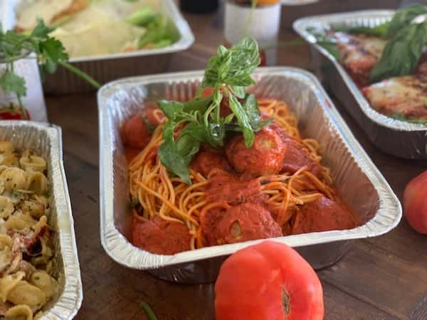 tray of spaghetti and meatballs