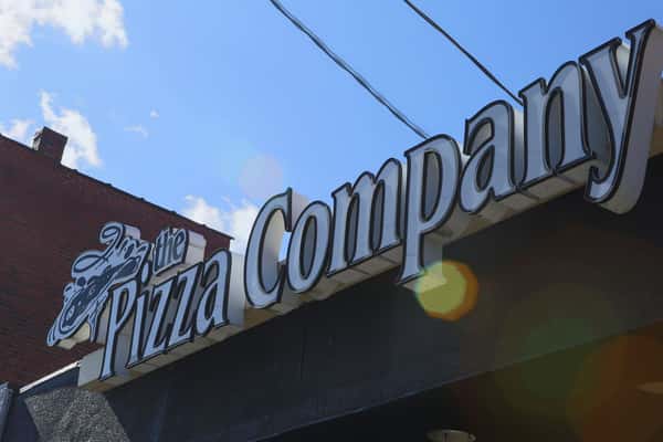 the pizza company sign