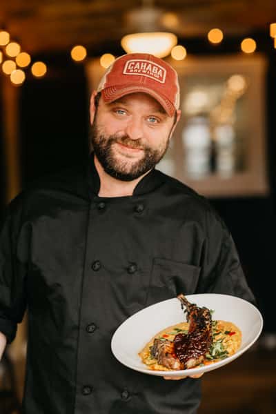 chef with plate