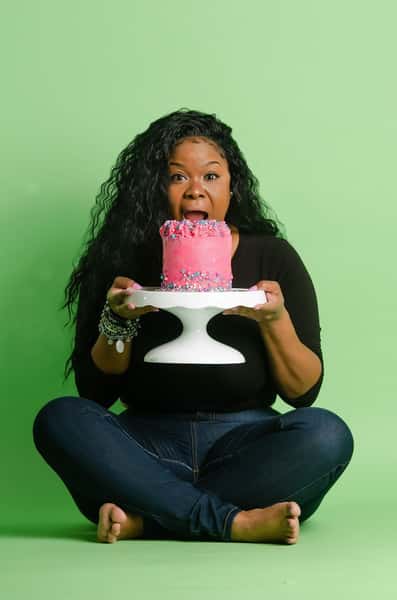 Tyreece Johnson holding a cake