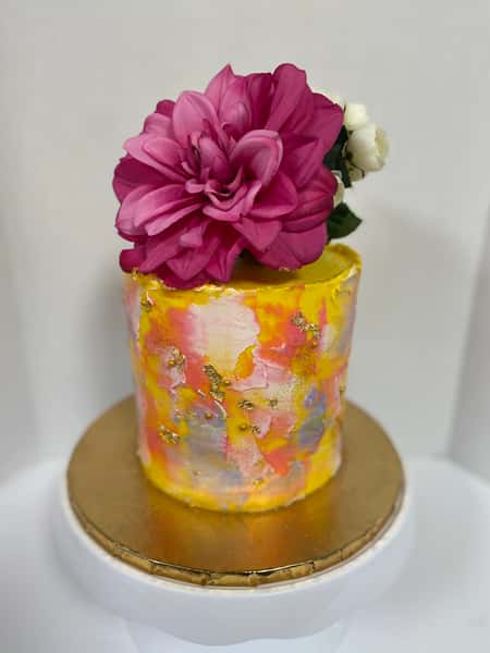 Large cake with flower topper