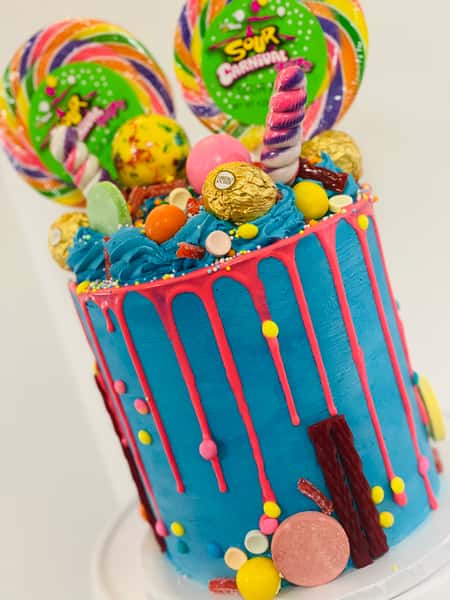Colorful cake with a variety of candy