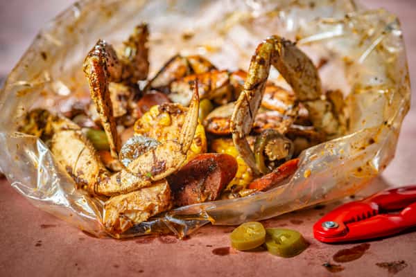 DUNGENESS CRAB CLUSTERS CAJUN JALAPEÑO SAUCE