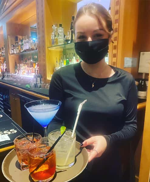 Staff serving a variety of cocktails