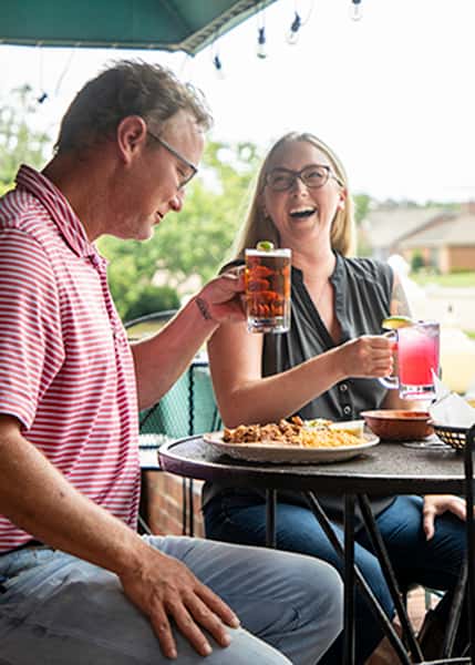 Patrons enjoying drinks and meals