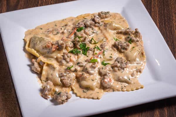 Beef Stuffed Mezzaluna with Sausage