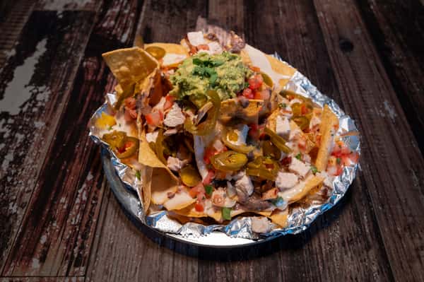 Loaded Chicken Nachos - Gas Monkey Icehouse - Bar & Grill in The