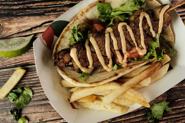 Peruvian Grilled Chicken Skewer on Flat Bread