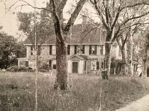 black and white old photo of barker tavern