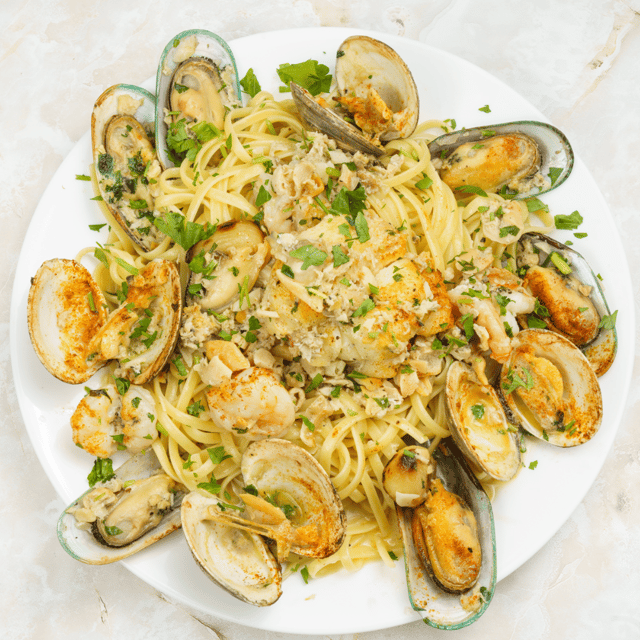Shrimp, Clams, Mussels Over Linguine - Mother Kelly's - Pizzeria