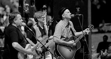 Cats On Holiday is a Cleveland based Swamp Pop band that has been pleasing audiences for 20 years with their own special blend of Louisiana inspired rock/roots/ Zydeco. The Cats are driven by founding member, songwriter, lead vocalist and guitar/ button-box player Denis DeVito. The Cats perform over 100 gigs annually at the best live music venues from as far West as the Lake Erie Islands and East to Cape Cod. COH has been a part of such cool events as The Great Blue Heron Festival, Hessler Street Fair, Parade the Circle, Lock 3 Live, Wade Oval Wednesdays, Ingenuity Festival, Burning River Fest, Nelson's Ledges' Lazy Daisy Festival, Starwood, Kent State Folk Festival, Akron's First Night, Boston Mills Art Festival as well as the resident band for the annual Towpath Marathon. The band also have a regular rotation of clubs in which they perform including the Music Box, Beachland Ballroom, Brother's Lounge, Water Street Tavern(Kent), G.A.R. Hall, Balloons(Ellicottville, NY), Parkview Niteclub, The Harp and many others. Over the years COH has shared the stage with such national acts as Los Lobos, Marcia Ball, Tab Benoit, Beau Soleil, Big Bad Voodoo Daddy, Buckwheat Zydeco, Carpenter Ants, The Iguanas, NRBQ, Leon Russell, and Terrance Simien, to name a few.