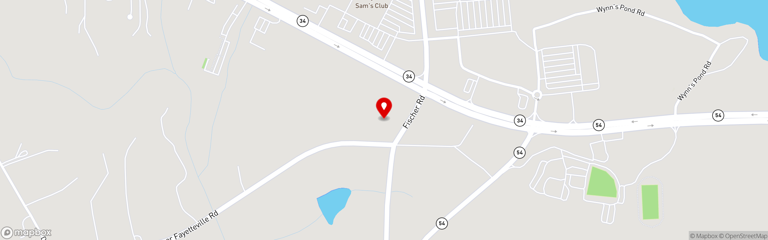 Street map pinning La Parrilla Mexican Restaurant in Sharpsburg, GA