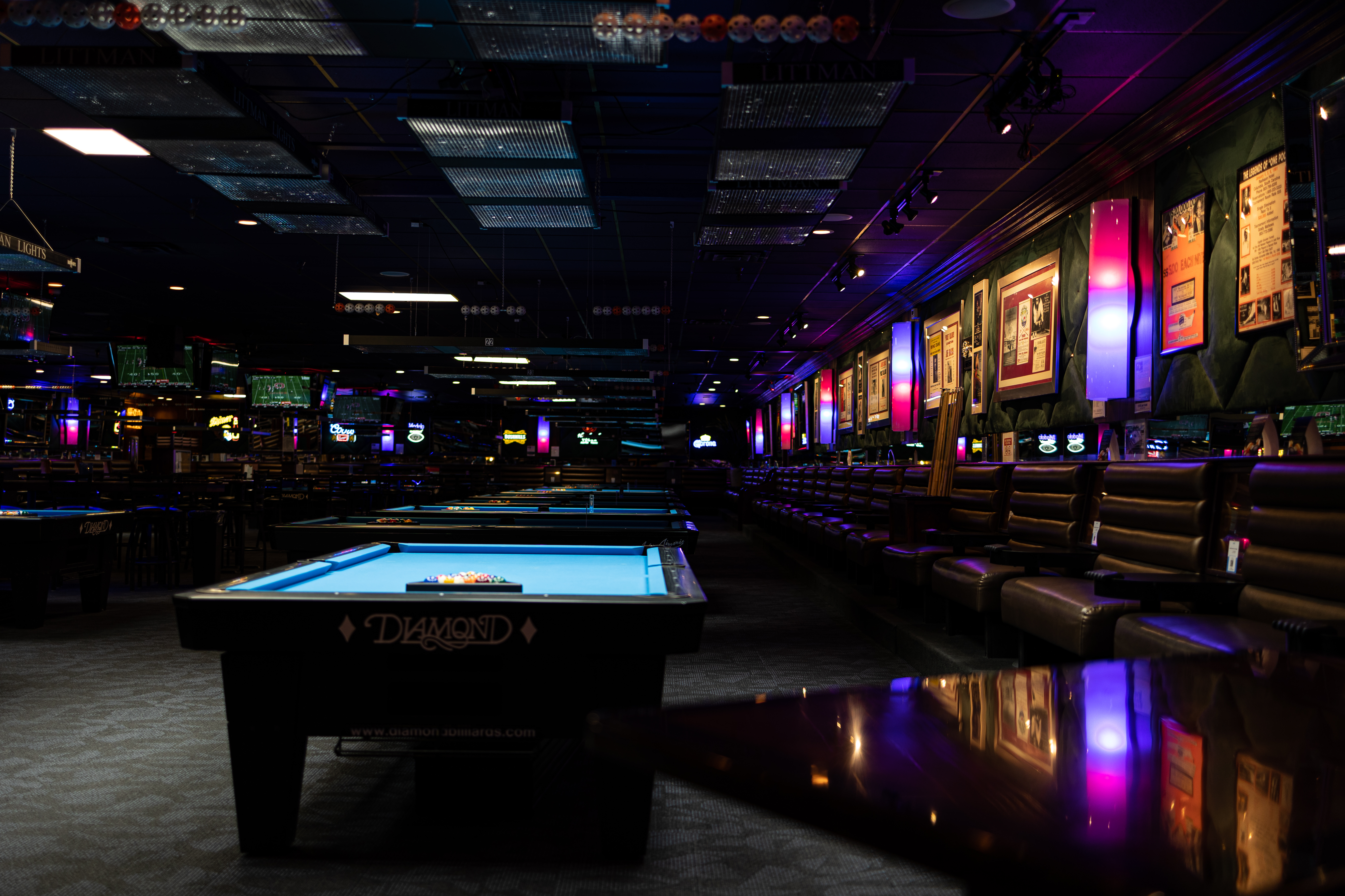 Premium Photo  Friends playing pool at billiard club and shooting